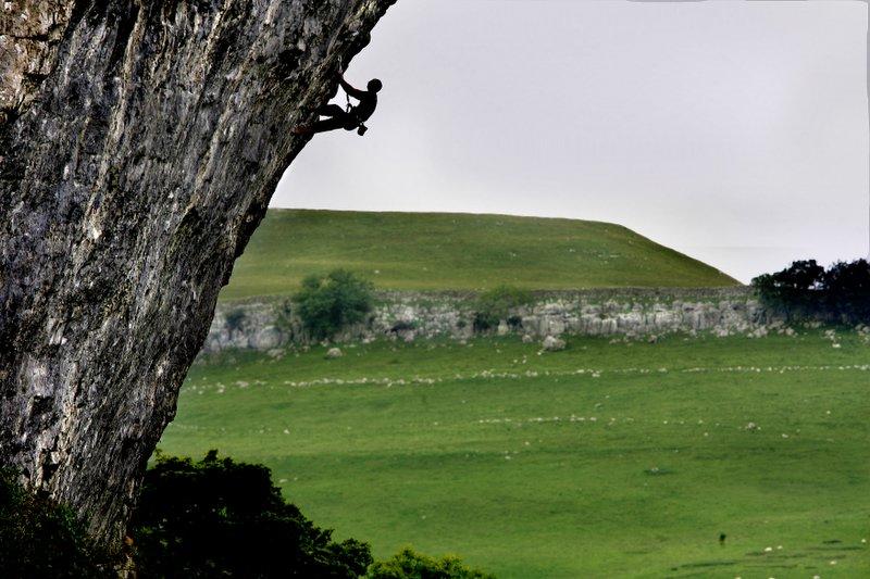 A climber on Kilnsey Crag