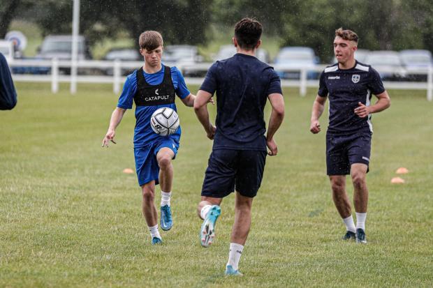 Guiseley players prepare for Barnsley fixture. Pic: via Guiseley