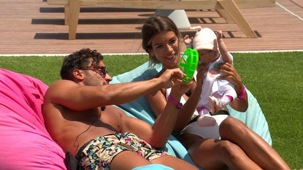 Craven Herald: Davide and Ekin-Su during the baby challenge. Love Island continues tomorrow at 9pm on ITV2 and ITV Hub. Episodes are available the following morning on BritBox. Credit: ITV