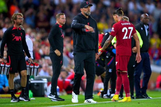 Liverpool's Darwin Nunez walks past manager Jurgen Klopp
