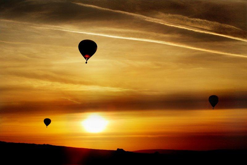 Three balloons fly over Lothersdale 