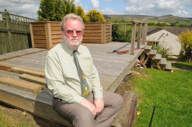 Bob Wright has been told to remove his decking from his garden or face court action by Craven District Council