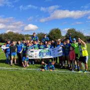 Silsden Storm Under-13s celebrate after winning the league title
