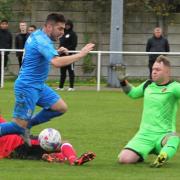 Zack Dale (blue) scored Barnoldswick's first equaliser against Congleton just after the break, but it was the last 10 minutes when the game really exploded into life. Picture: Peter Naylor.