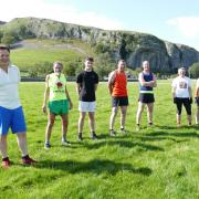 The runners line up ready for the off