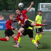 Action from a clash between Campion (red and black) and Steeton earlier this season. Picture: John Chapman.