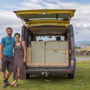 Tom Lake and Caitlin Green with one of the vans they converted