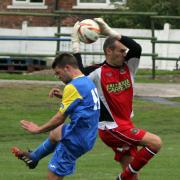 Ben Gorman (left) in action for Barnoldswick Town a few years ago. Picture: Pete Naylor.