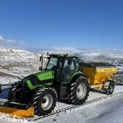 Plough and gritter out after a light fall of snow at Fleet Moss. Pic Thomas Beresford