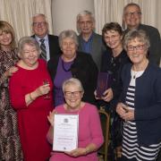 Representatives of Clapham Vilage Store receive their Queen's Award in 2019