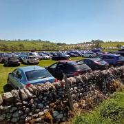 Fields given over to visitor parking in Malham