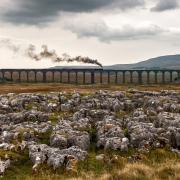 The Railway Touring Company's Waverley steam service crosses the Ribblehead Viaduct. Picture Bob Green