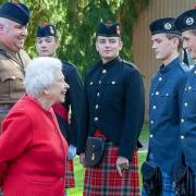 The Queen chats to Skipton twins James and John Brown, at Balmoral in 2019