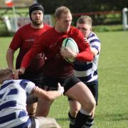Skipton's (Red) Hamish Munro scored a hat-trick for thr Reds at the weekend. Pic: Georgie Green