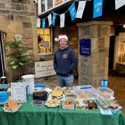 Andrew Mear mans the charity cake bake at High Corn Mill