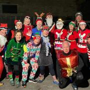 Skipton AC members dressed up for their Christmas fun run
