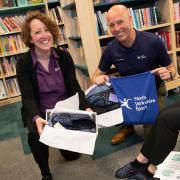 Library assistant Toria Morris and Simon Pierce, health and wellbeing manager at North Yorkshire Sport, prepare for one of last year’s slipper socials.