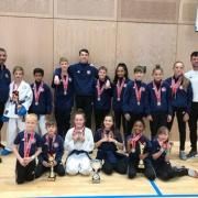 Students of Quest Karate Club, Skipton, show off their medals from a competition that they competed in. Pic: Quest Karate Club
