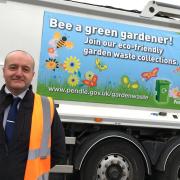 David Walker with one of the new green bin logos