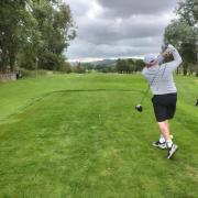 Sam Baldwin teeing off at Skipton Golf Club