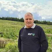 Professor Alastair Driver among new woodland in Broughton Sanctuary