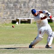 Suton's Dave Snowden scored 52 for his side