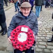 Brian Eskriett, 94, laying a wreath on behalf of Blind Veterans UK