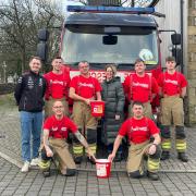 Back: Josh Ockerby, Chamber of Trade; firefighter Liam Firth; watch manager James Hastings;  Kate Midgley, Chamber of Trade; firefighter Chris Horsley; firefighter Isaac Hastings. Front:  Managers Craig Lyons and Ben Rymer