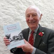 John Pallister with the book he has written on Bolton by Bowland