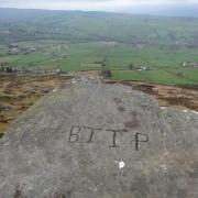 A stone marked Boundary Thomas Townley Parker 100 yards within the Sutton boundary near Cowling Pinnacle