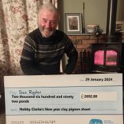 Nobby Clarke and his cheque for Manorlands