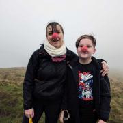 Oscar Jackson, and mum, Jo, with their red noses on Penyghent