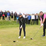 Pictured on the 13th tee at Skipton Golf Club when the new 2024 season officially teed-off are Men's and Ladies' Captains Ollie Burton and Sarah Howes, closely watched by some of the members.