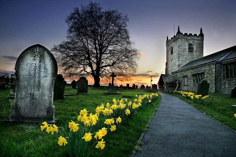 Daffodils escort the eye up the path to the historic All Saints’ Church between the hamlets of Elslack and Broughton.