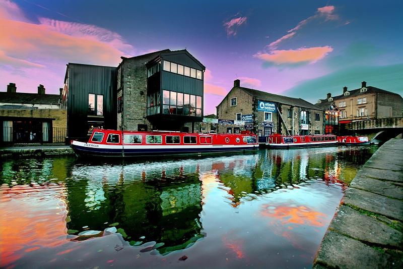 Reflected hues bring to life the industrial basin on the Leeds to Liverpool canal at Skipton.