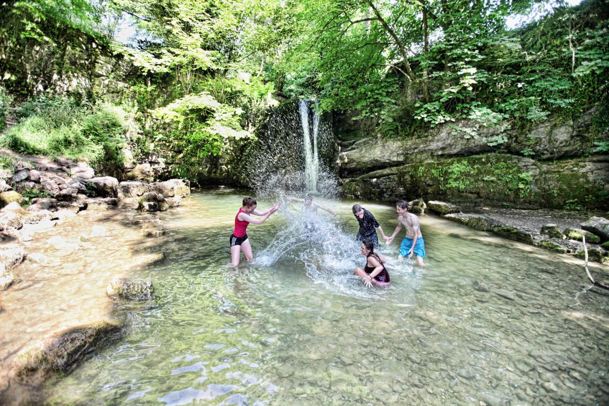 Pupils of Morecambe Community College  cool down at Janets Foss near Malham.
