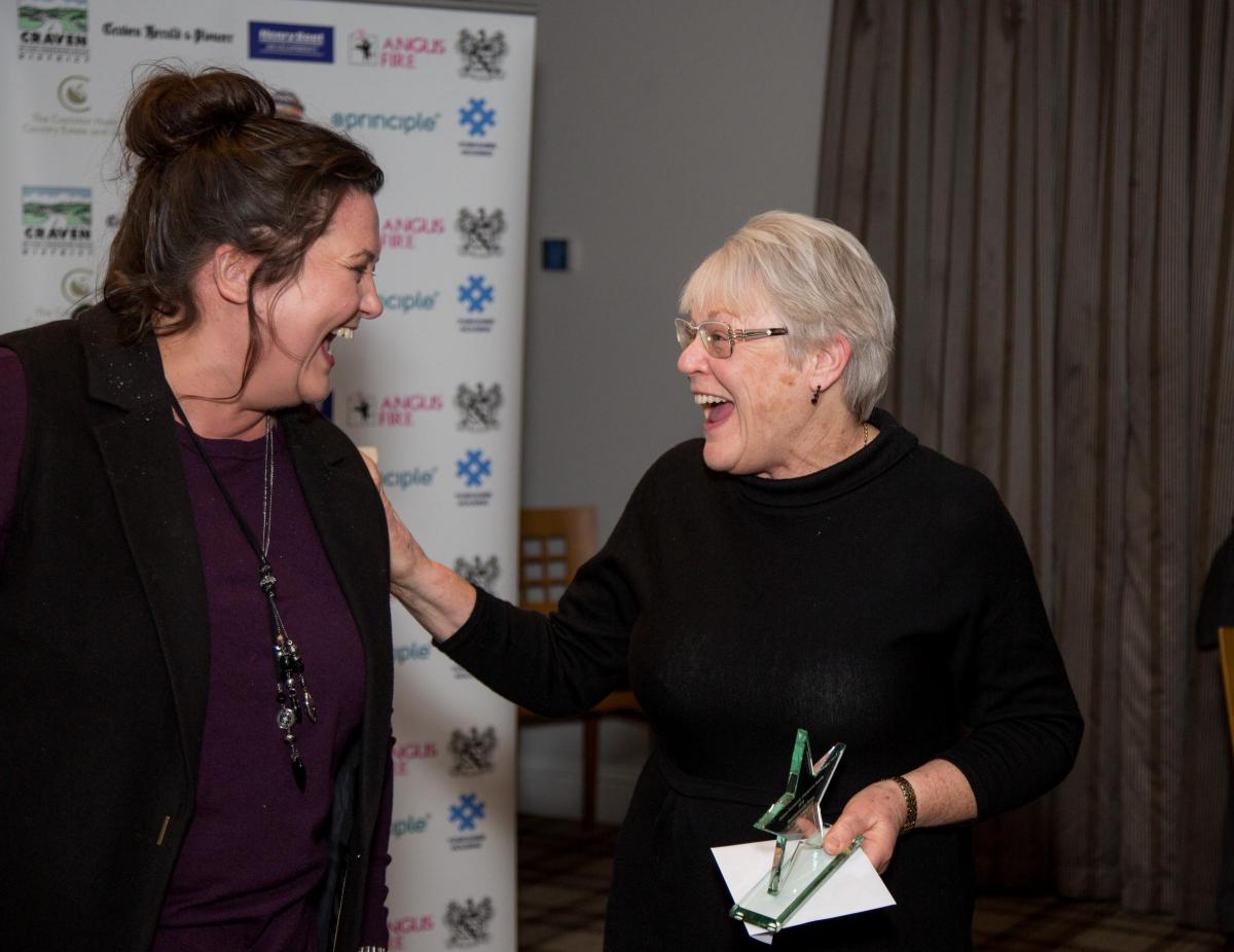 Sue Mann of Clapham Shop with Victoria Robertshaw of Keelham Farm Shop who presented the award