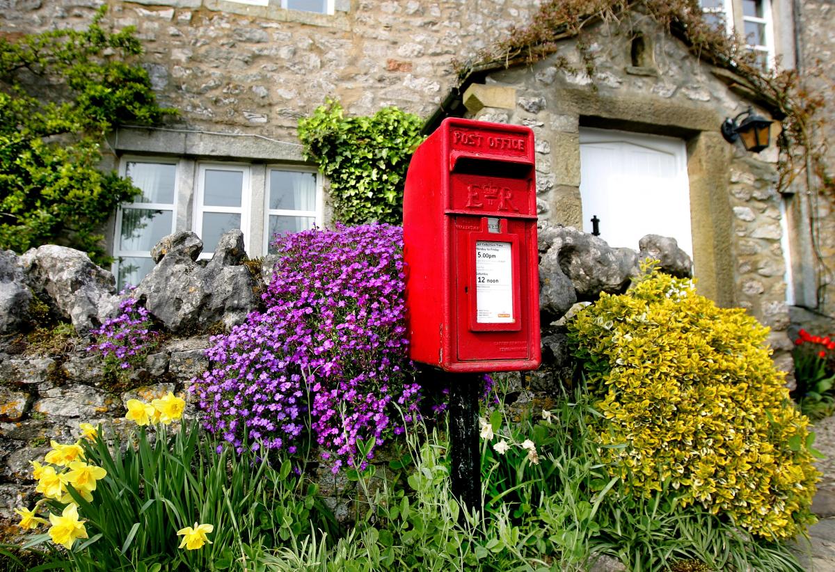 The former Post Office in Conistone, near Kilnsey, presents a spring scene to warm the heart in this picture by Stephen Garnett. Along with the glorious daffodils, the old post box is framed by purple aubretia and yellow-green euonymus.