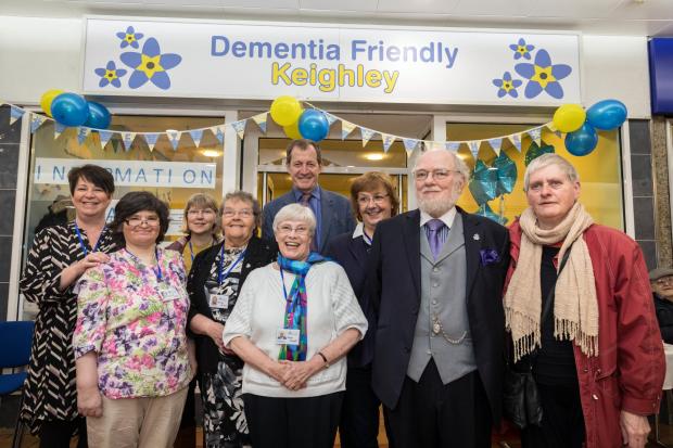 Former Prime Minister's communiation chief Alastair Campbell, with Dementia Friendly Keighley supporters, outside the charity's Keighley base in spring 2018